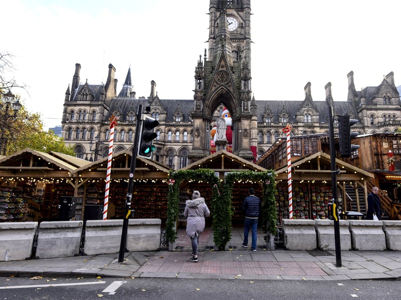 The Christmas market in Manchester city centre, which should have been teeming, stands almost empty during the Covid pandemic