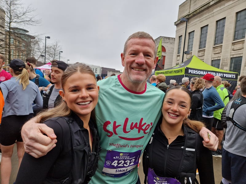 A proud dad with his daughters, as all three prepared for the race. Photo: David Kessen, National World