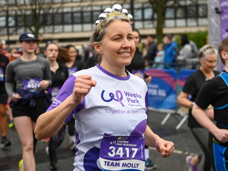 Runners after passing the finishing line at Arundel Gate. Photo: Charley Atkins, National World
