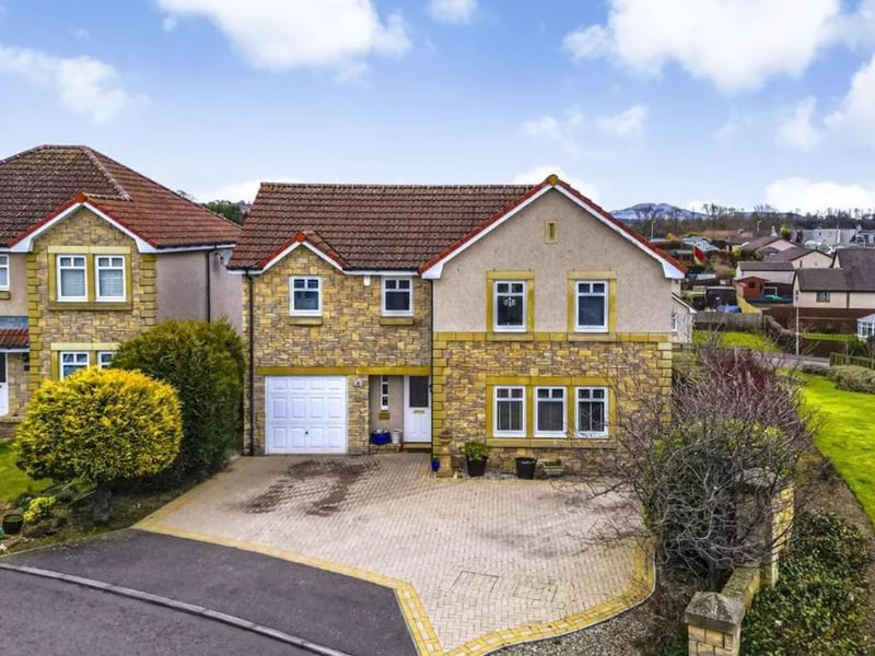 This four bedroom detached house is now for sale for offers over £350,000, having been reduced by a total of £25,000 since it was first listed in November 2024. The 'spacious' family home has two bathrooms and two receptions, is close to Cameron Bridge train station and has an enclosed rear garden, garage and driveway. It's a short drive from Leven town centre and close to the Fife coastal path, the beach and golf courses.