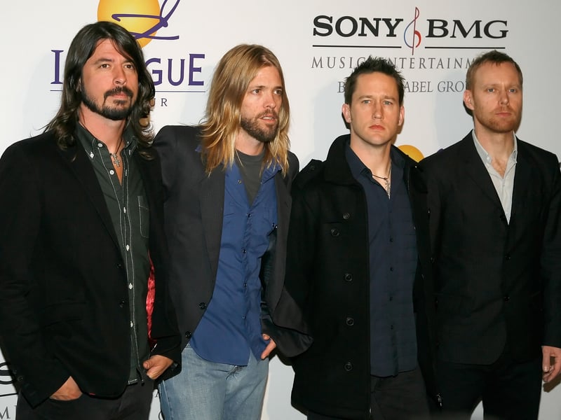 (L-R) Musicians Dave Grohl, Taylor Hawkins, Chris Shiflett, and Nate Mendel of the Foo Fighters arrive at the Legendary Clive Davis Pre-Grammy Party held at the Beverly Hilton Hotel on February 9, 2008 in Beverly Hills, California.