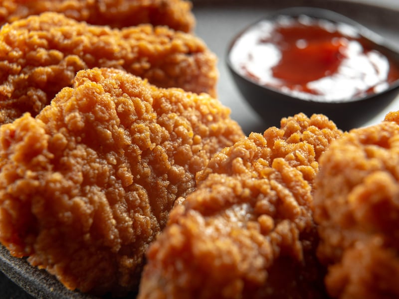 KFC is one of the biggest fast food brands in the world thanks to the unique recipe developed by Colonel Saunders in the 1940s. Only two company employees know the perfect mix of herbs and spices - and they aren't allowed to travel together. Nobody knows where the recipe is stored - a vault with two-foot thick walls and around-the-clock security. It's accessed by a pin code only known by the same two executives who know the formula.