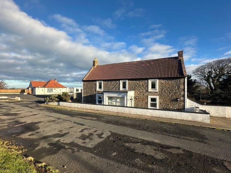 The sale includes the business, detached guest house accommodation and owner's flat