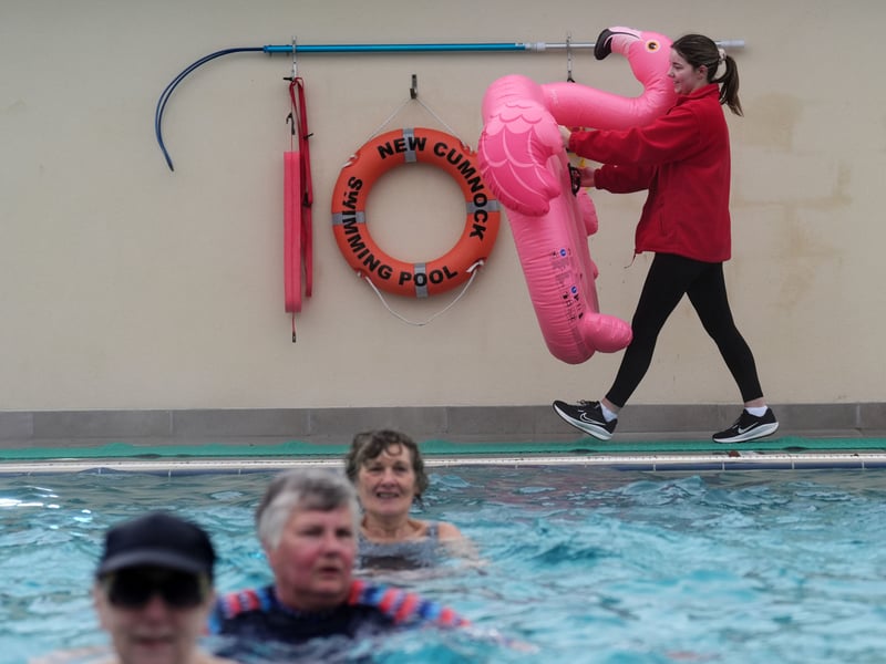 Life guard Annabel McClounie moves the iconic inflatable flamingo.
