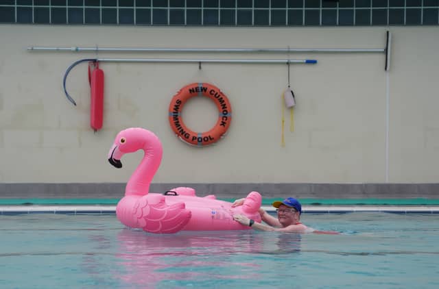 Margaret Holden with her flamingo inflatable.