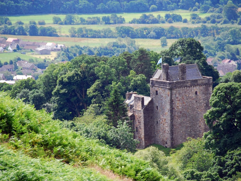 Sitting above Dollar Glen, the beautiful Castle Campbell emerges on a narrow bridge which is overlooked by the Ochil Hills.
Steep ravines fall away on either side of the castle, through which thunder the Burn of Care and the Burn of Sorrow.
The 15th Century fortress was once the home of the powerful Campbell earls of Argyll, and has connections with historical figures such as John Knox and Mary Queen of Scots.
It was originally known as Castle Glume but after it passed through marriage to Colin Campbell, 1st Earl of Argyll, it served as his impressive Lowland seat close to the action of Stirling Castle with th,e name then changed.