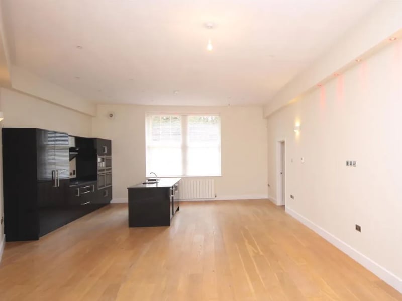 The kitchen/dining/living room inside the three-bedroom house for sale at Golden Hill Fort, a striking old Victorian fortress on the Isle of Wight, which has a guide price of £295,000