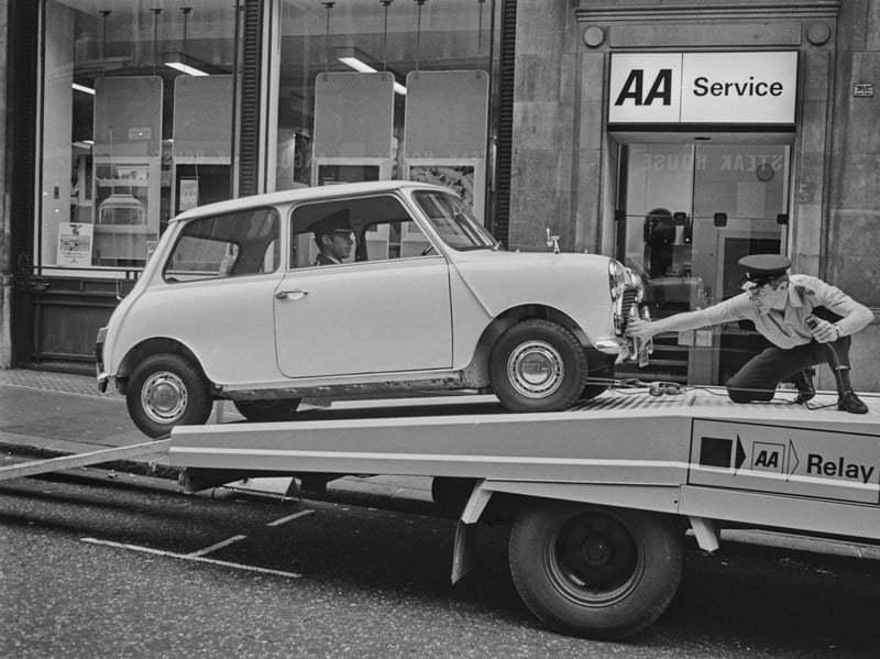 The Mini was the fourth best-selling car of the 1970s, with 611,695 registered, according to startrescue.co.uk. The British style icon was popular not just for its looks but for being cheap, efficient and fun to drive. An AA Relay recovery vehicle is pictured coming to the aid of a stricken Mini driver in 1973.