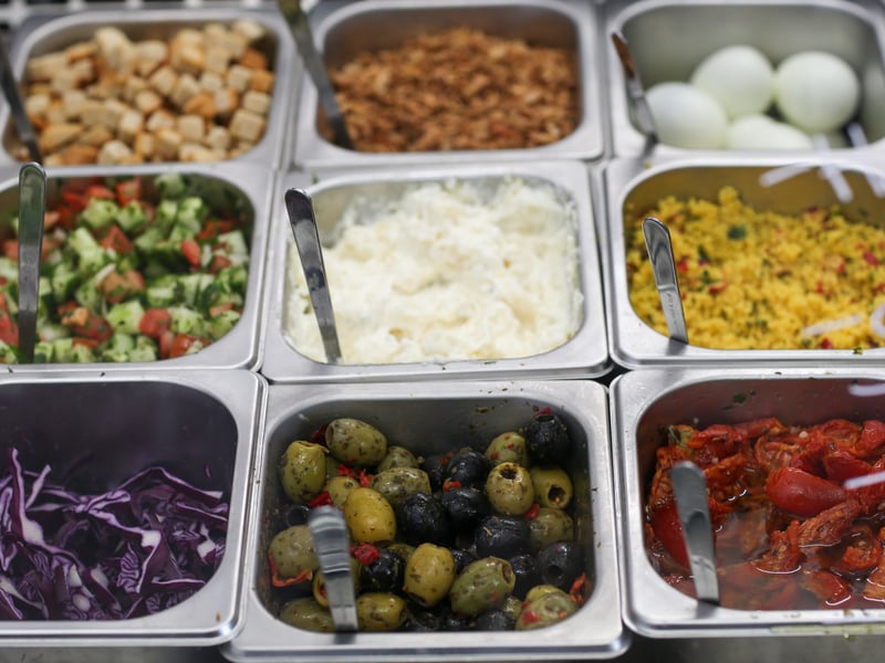 There is a mix and match salad bar for customers to create their own salad bowl.