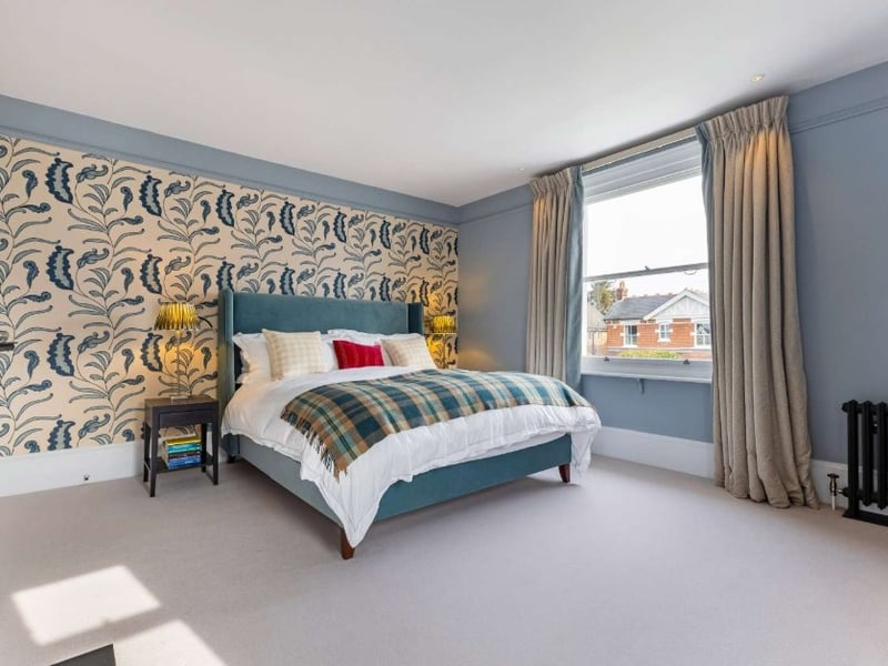 The listing says: "This stunning villa, built circa 1910, occupies a large corner plot on Beach Road. The house has been lovingly renovated by the current owners to provide an exceptional family home." 