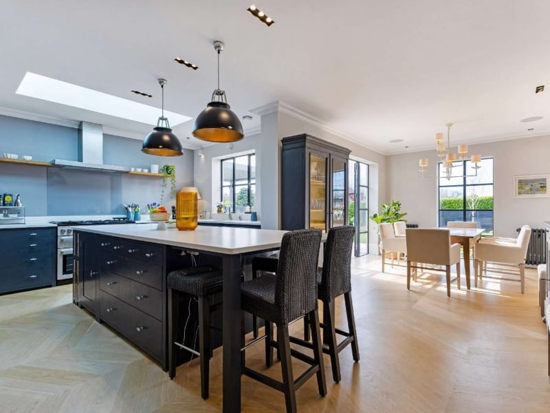 The listing says: "This stunning villa, built circa 1910, occupies a large corner plot on Beach Road. The house has been lovingly renovated by the current owners to provide an exceptional family home."