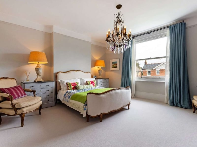 This home comes with four bedrooms, four reception rooms and three bathrooms as well as a spacious garden. 