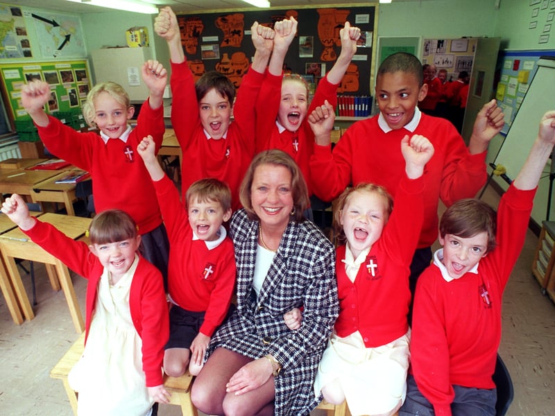Something to cheer about, Howick CE Primary School headteacher, Lesley Maddock, with class representatives, front row, from left, Lorna Kellett, five, Joseph Whitingham, five, Rella Critchley, five and Sam Pratt, seven, back row, from left, Kate Harrison, nine, Daniel Peters, eight, Jenny Harrison, eight and Marcus Alty, 10, celebrate their excellent Ofsted report at the school at Howick, Penwortham near Preston