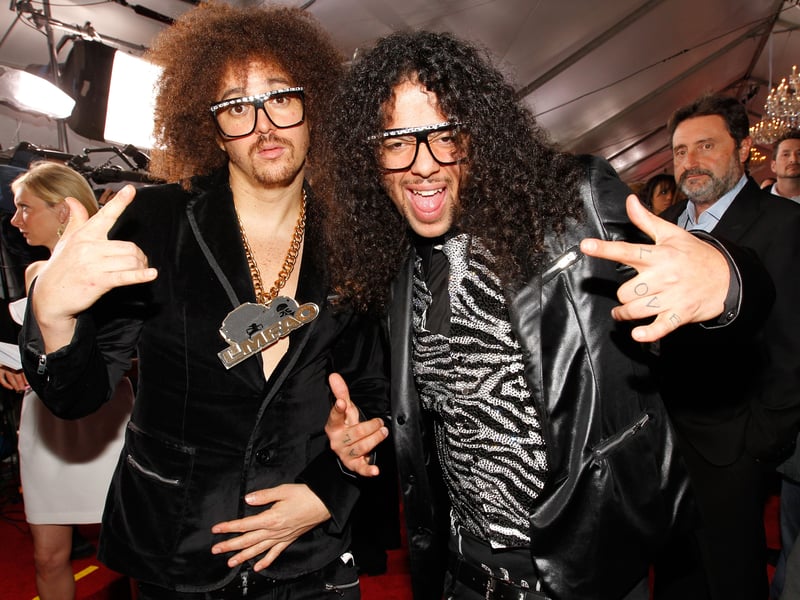 Released in 2011, Party Rock Anthem is an electronic dance-pop hit that defined the early 2010s with its high-energy vibe and distinctive shuffling dance craze. The song's catchy beat and party-centric lyrics, combined with its visually chaotic and vibrant music video, made it a global phenomenon, synonymous with the era's dance music scene.
