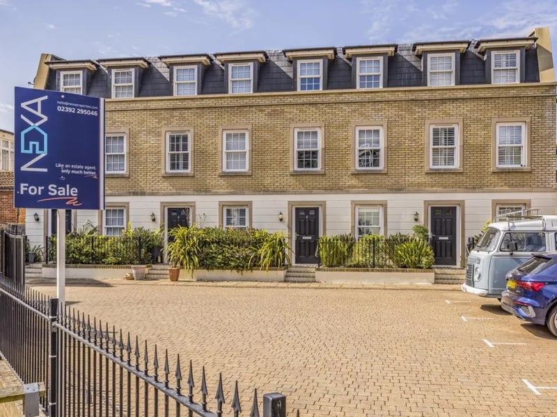 This home comes with three bedrooms, three bathrooms and two reception rooms as well as a garden.