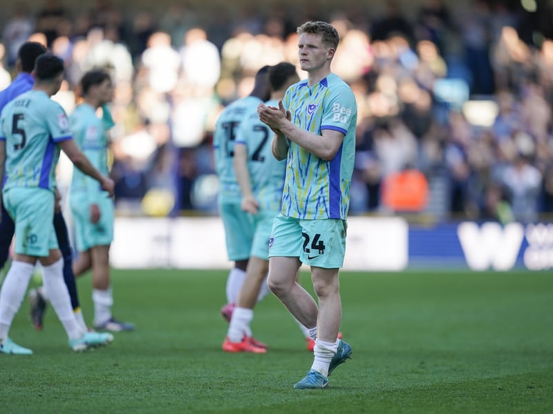 Pompey's Terry Devlin applauds the 2,000 travelling fans at Millwall.