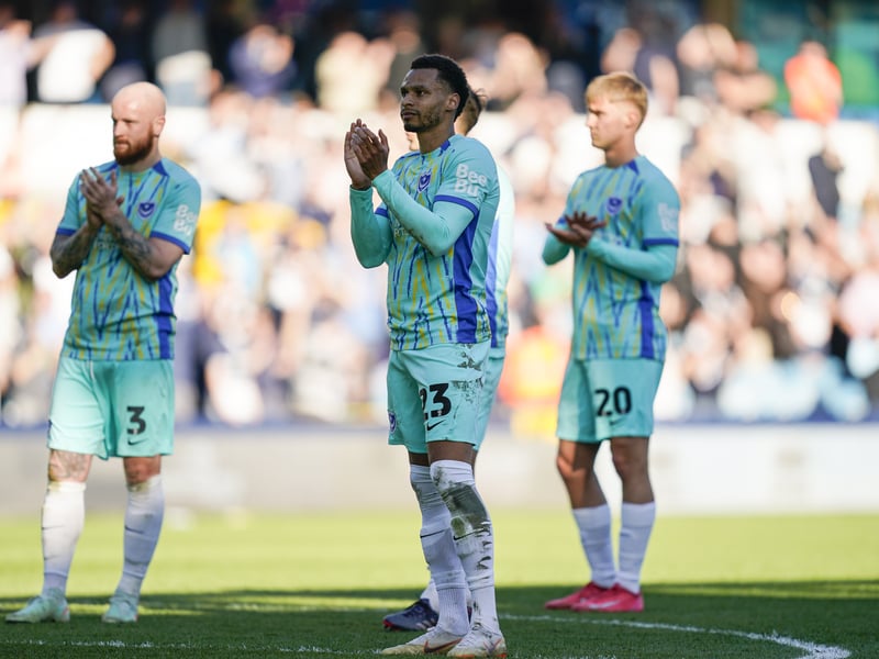 Pompey players applauds the 2,000 travelling fans at Millwall.