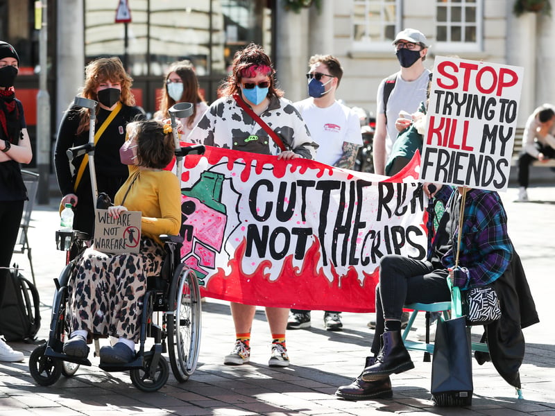 Protests make their views known in the Portsmouth Guildhall Square. Picture: Nathan Lipsham
