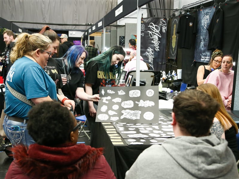 Looking through tattoo samples. Picture Nathan Lipsham