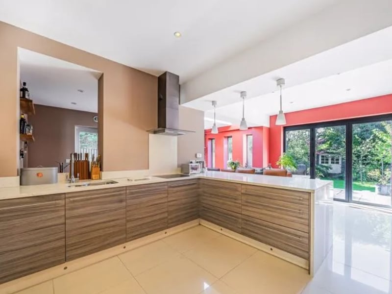 This home has four bedrooms, two bathrooms and three reception rooms as well as a snug room and a sun room. 