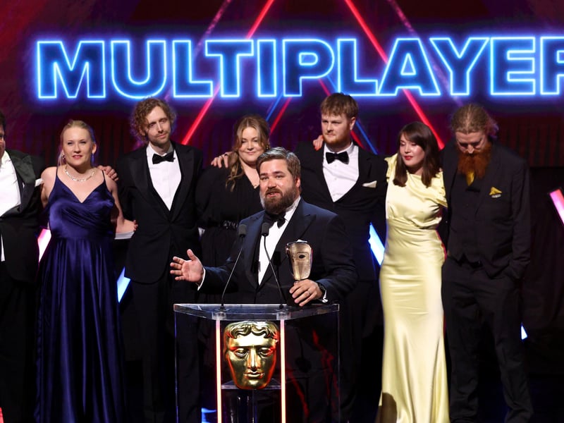 Johan Pilestedt accepts the Multiplayer Award on behalf of the Development Team for 'Helldivers 2' on stage during the BAFTA Games Awards 2025.