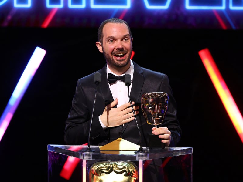 Adrian Cuevas accepts the Artistic Achievement Award on behalf of the Development Team for 'Neva' on stage during the BAFTA Games Awards 2025.