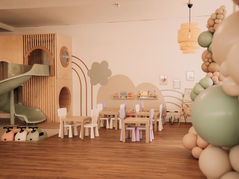 The soft play café has a seating area for children to enjoy.
