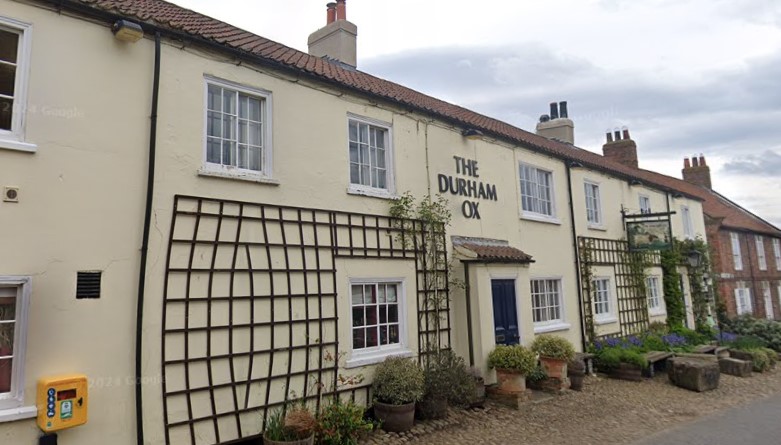 The Durham Ox is a 17th century pub, located in the beautiful area of Crayke. The pub is in the distance of Castle Howard and Helmsley, and overlooks the Vale of York. 
