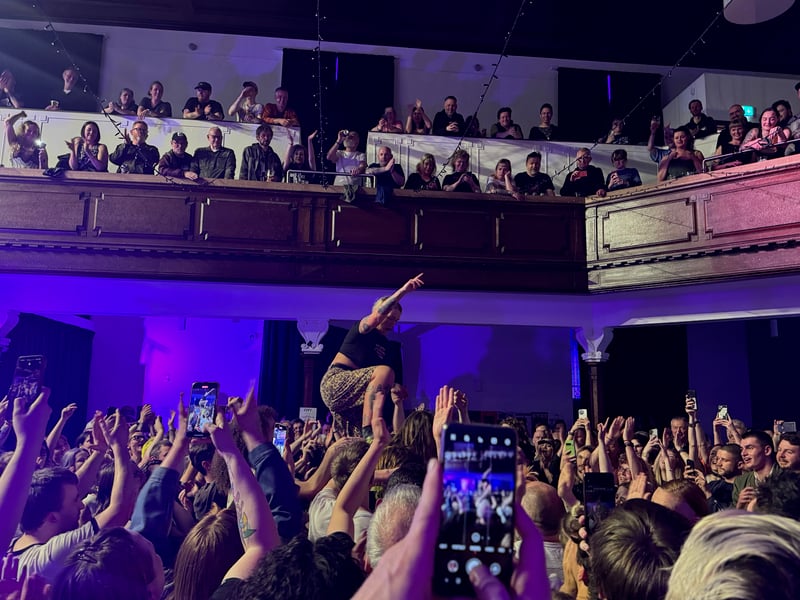 The crowd were urged to - and pretty much succeeded in - forming a human pyramid.