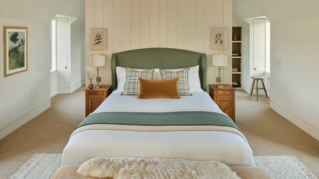 A main bedroom inside the Omaze Million Pound House Draw property on the shores of Loch Rannoch in Perthshire. A gran has won the £4 million mansion in the Scottish Highlands and will celebrate - by watching Braveheart.