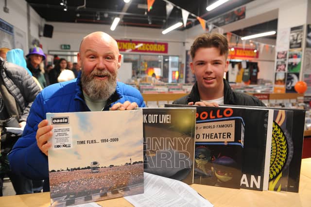 Gavin Quinlan and son Niall, of Fairburn Ings, with their record haul after over eight hours in the queue.