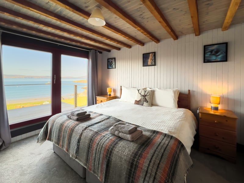 The lodge has five generous en -suite bedrooms over two levels, all with stunning views. It might be hard to move in the morning.