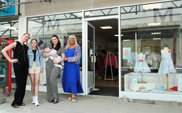 Owners, Lizanne Mcleod (far left) and Melanie Smith (far right) outside the newly opened Marabella's in Wellington Way, Waterlooville.
