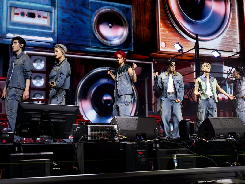 (L-R) Sunghoon, Ni-ki, Heeseung, Jake, Jungwon and Jay of ENHYPEN perform at Sahara Tent during the 2025 Coachella Valley Music and Arts Festival at Empire Polo Club on April 12, 2025 in Indio, California.