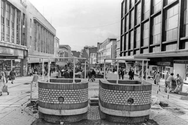 The Moor, Sheffield city centre, in 1983, showing the brick trams and shops including Woolworths, left, and Debenhams, right