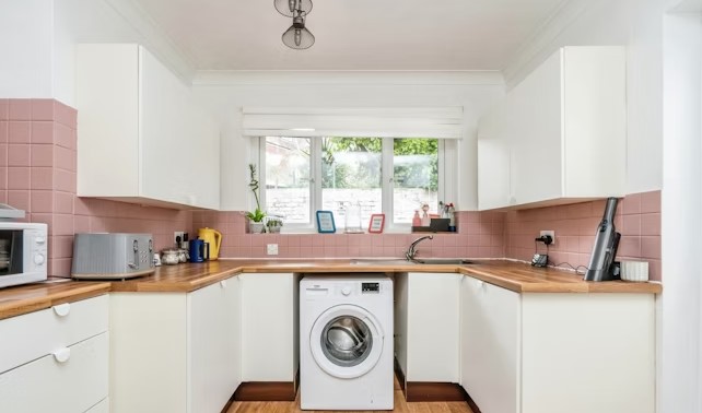 The Purple Bricks listing says: "Internal accommodation is exceptionally well presented and offers a lounge. separate dining room, re-fitted kitchen, 2 double bedrooms and a bathroom." 