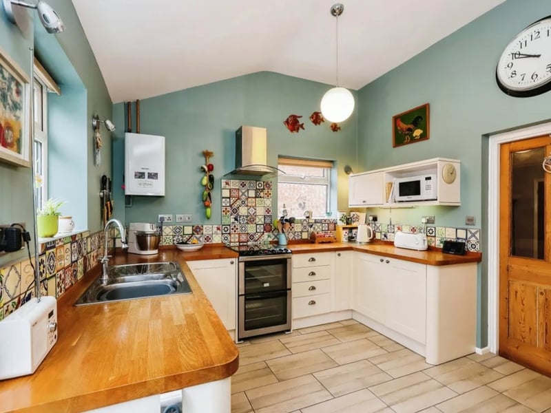 This home comes with three bedrooms, two bathrooms and two reception rooms. 