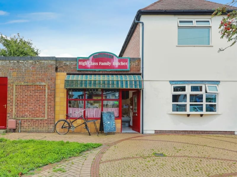 The listing says: "Currently a butcher's shop the commercial unit offers the potential for a fantastic investment return and subject to planning permission can provide a generously sized extension to the house." 