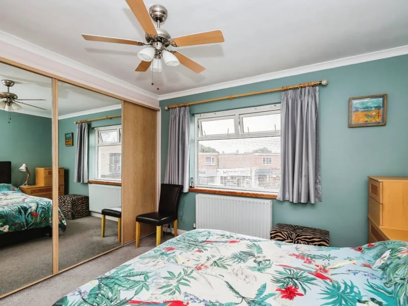 This home has three bedrooms, two bathrooms and two reception rooms - and this sale also includes a butchers. 