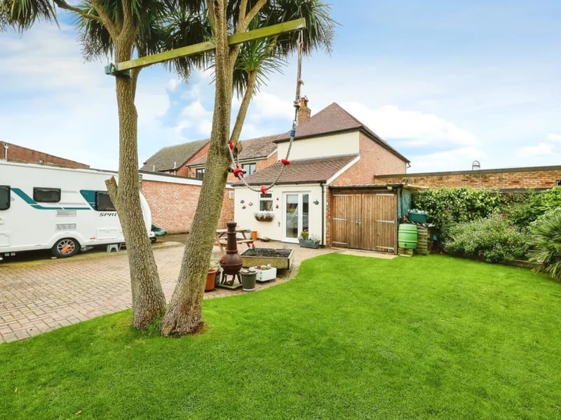 The listing says: "Morris Dibben are delighted to present to the market a superb and rare opportunity to purchase a three bedroom detached house with a commercial shop included in the sale." 