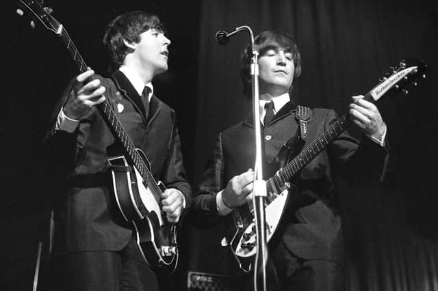 Paul McCartney and John Lennon on stage at the ABC Theatre in Huddersfield, November 22, 1963. Mr Beriff said: "This was the day their single 'I Want to Hold Your Hand' was released and this venue was the first time they had performed the number in front of a live audience."