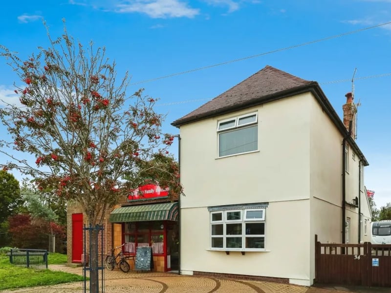 This detached home is on the market for £430,000 and it comes with three bedrooms, two bathrooms and two reception rooms as well as the commercial unit next door which currently operates as a butchers. 