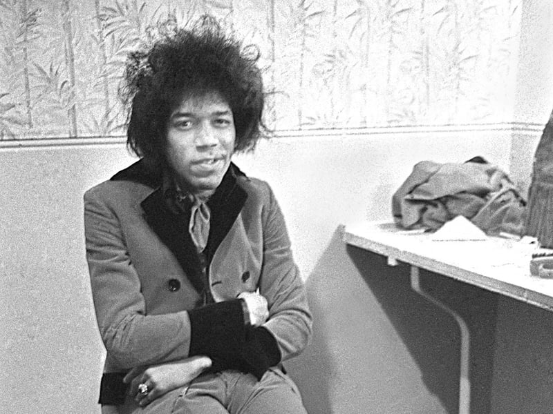 Jimi Hendrix relaxes in his dressing room at the Odeon Theatre in Leeds before his concert on April 5, 1967. Mr Berriff described the guitar virtuoso as quiet.