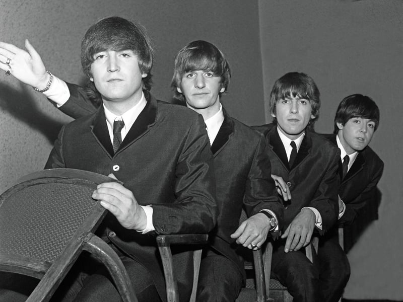 The Beatles playing at trains backstage at the ABC Theatre in Manchester on October 14, 1964. Mr Berriff said that the image was suggested to him by John Lennon, who grabbed the chairs and arranged the rest of the band.