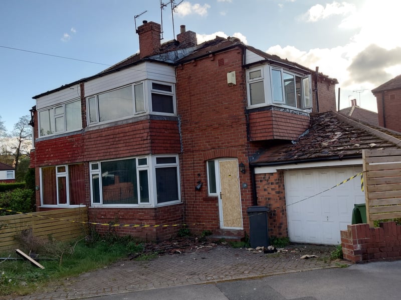 Access to the property has been boarded off.