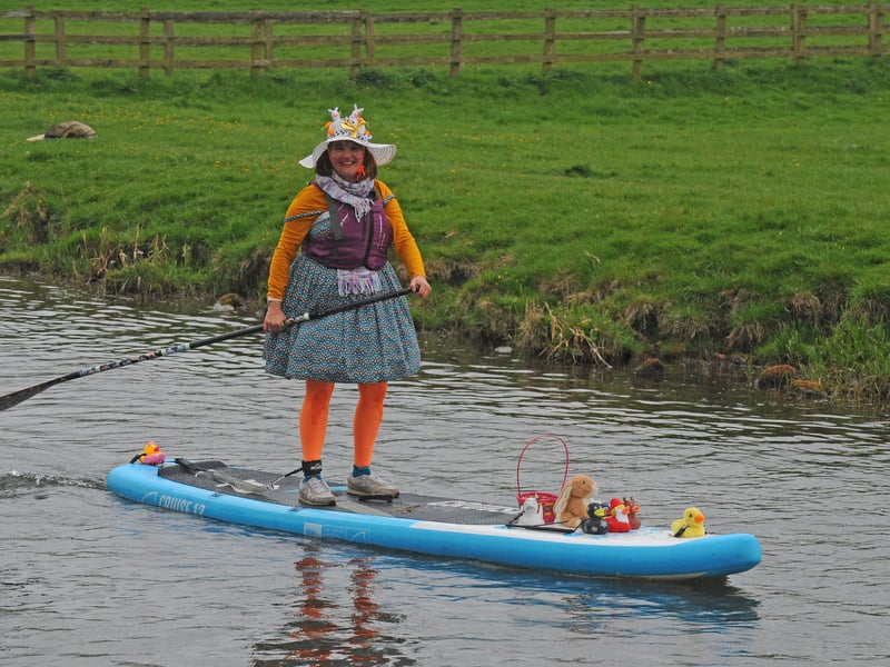 Amy Smith paddling in her fancy dress.
