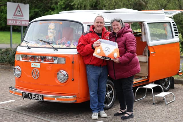 Car enthusiasts rushed to Port Solent to showcase their love for vintage camper vans. Pictured is Dave and Jill Britton with their van Marge