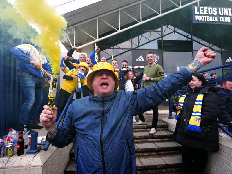 Leeds United fans celebrate promotion to the Premier League outside Elland Road. 