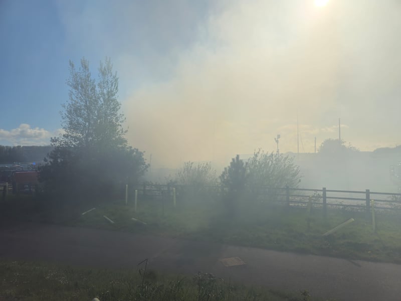 Thick smoke from the scene of the fire