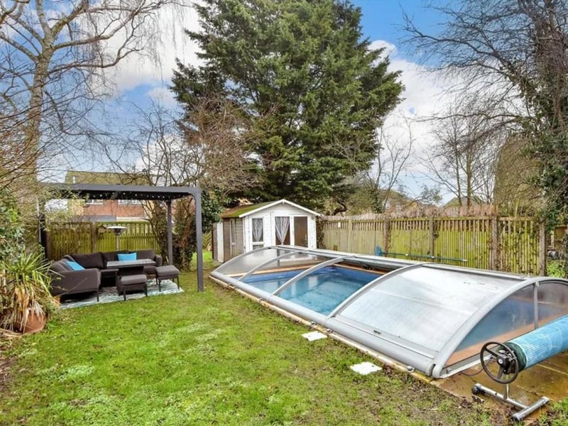 You can really make the most of the summer in the exceptional garden of this three-bedroom semi-detached house on Hollow Lane, in Snodland, Kent. It boasts a heated swimming pool, a great entertaining space and a lovely summerhouse. It's listed for sale with Wards, with a £530,000 asking price.